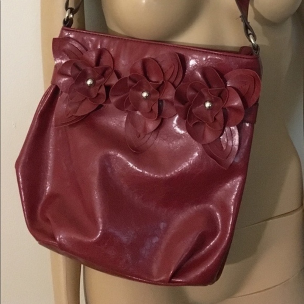 Nicole Miller cross body burgundy leather floral  handbag